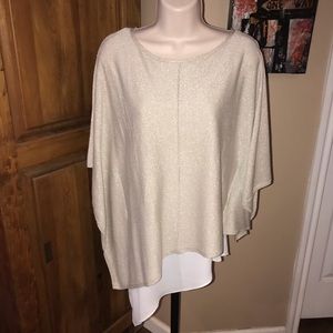 White House black market light gold flowy top with a white tank underneath